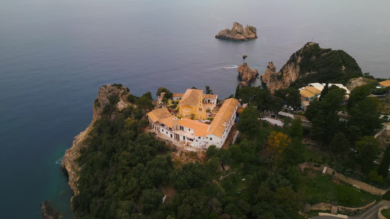 A historic Greek Orthodox monastery, is perched on a high cliff overlooking the beautiful bay of Corfu.