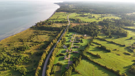 beautiful aerial view of a scenic coastal highway in latvia. strante to ulmale, saka parish, south kurzeme.