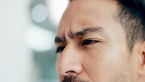 Face-of-man,-reading-and-thinking-in-office