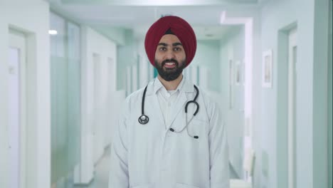happy sikh indian doctor smiling