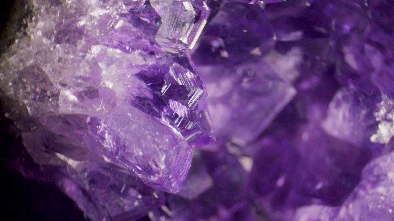 An amethyst geode rotating view under stereo microscope
