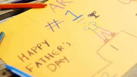 Paintings-and-happy-fathers-day-message-on-paper