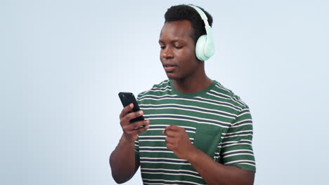 Music,-phone-and-happy-black-man-dancing