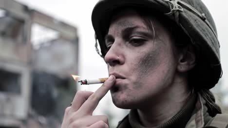 a soldier's moment of reflection: battled and scarred, she lights a cigarette amidst the ruins of war, emphasizing the hidden struggles of combat life