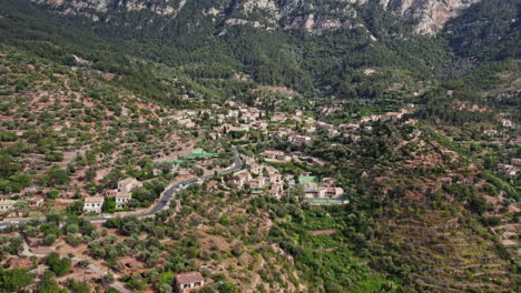 Town-View-Of-Deià,-Mallorca,-Balearic-Islands,-Spain---aerial-panoramic