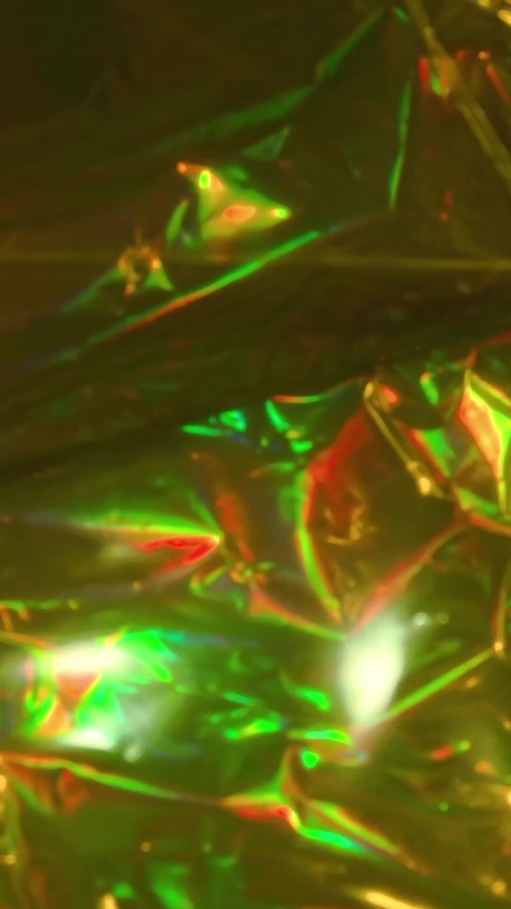 Sfondo astratto di lamina metallica iridescente e scintillante