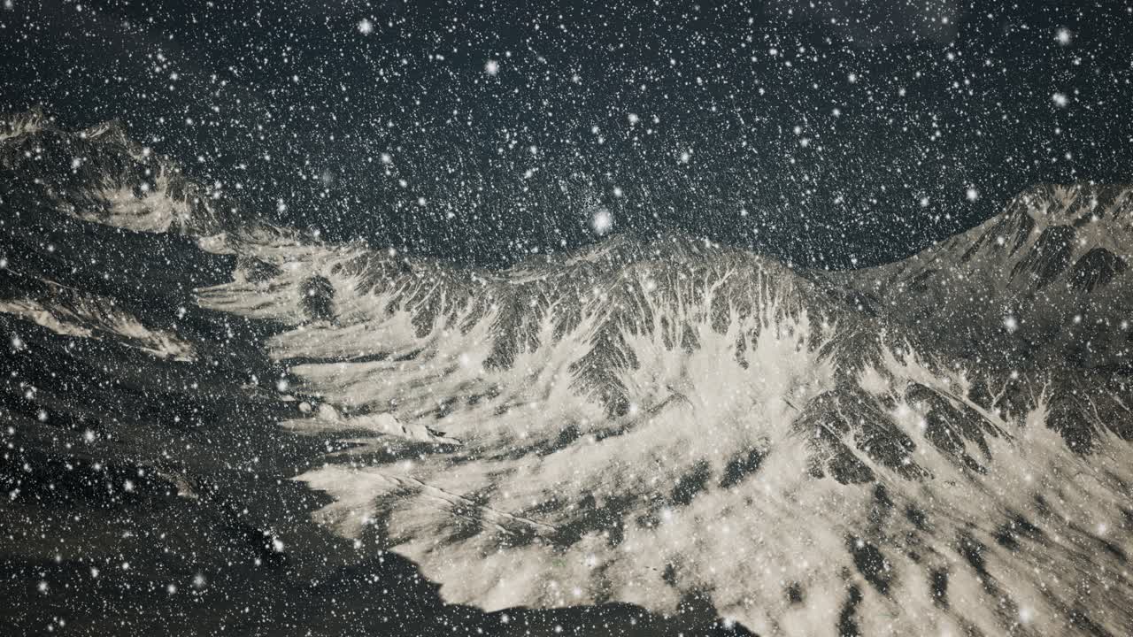 눈이 많이 내리며, 눈송이에 초점을 맞추고, 배경에 산이 있습니다.