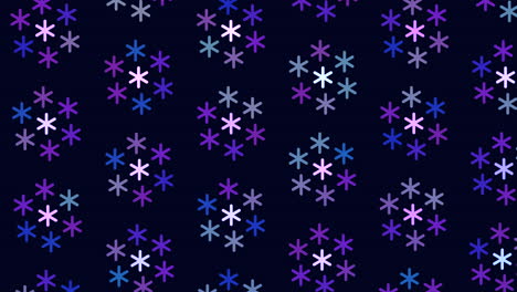 patrón simétrico de copos de nieve púrpura y azul sobre fondo negro