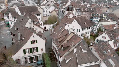 aerial crane-up reveal of basel picturesque cityscape in switzerland