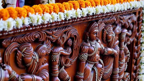 ornate wooden carving with floral decorations