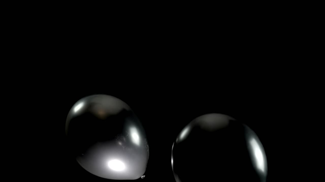Watch black balloons fall gracefully from top to bottom, creating a striking visual. The seamless effects enhance the movement, with a clean background to keep the focus on the dramatic descent.