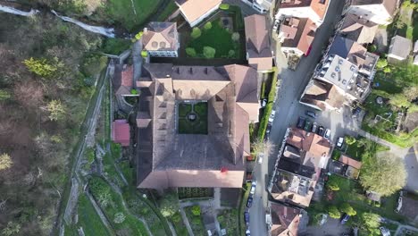 a bird's-eye perspective captures the rooftops of the residential area surrounding walensee in wessen, schweiz, showcasing the essence of community living amidst natural splendor
