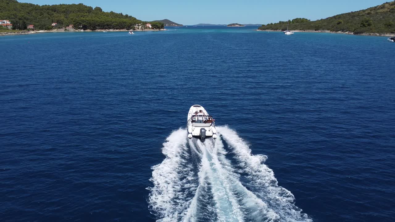 A close up view of a boat sailing through Zadar in Croatia