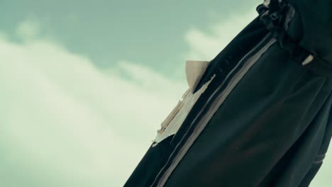 Close-up-of-closed-boat-awning-being-hit-by-wind-on-the-lake