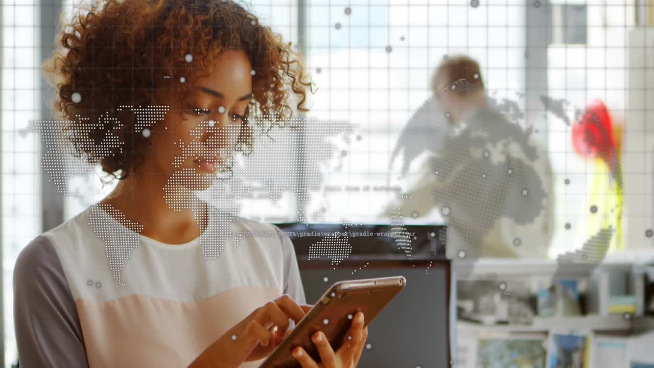 Woman tapping tablet and causing map and chat bubbles multiplying while monitoring business alerts