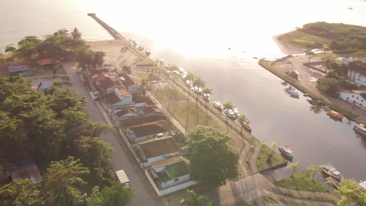 Aerial View Over Colorful Houses In The Town With The Sunrise
