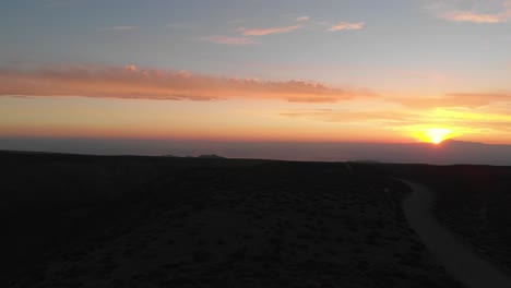 Aerial-shot-of-sunset-in-the-Atacama-Desert,-Chile,-South-America