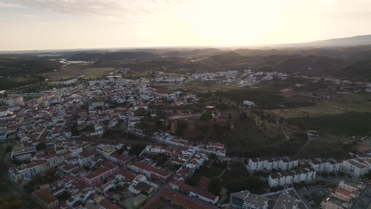 Circling aerial around the Castle of Silves in Algarve, Portugal