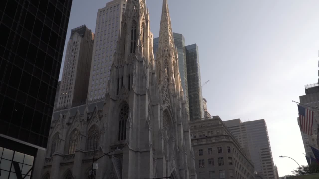 Slow motion tilt up of Saint Patrick´s Cathedral on fifth avenue, Manhattan, New York City. Moving from down view to up view from the left side.