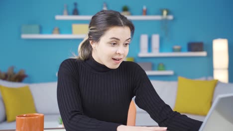 Confused-portrait-of-successful-young-entrepreneur-woman-working-in-home-office.