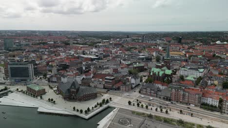 aerial pan of city coastline, aarhus, denmark