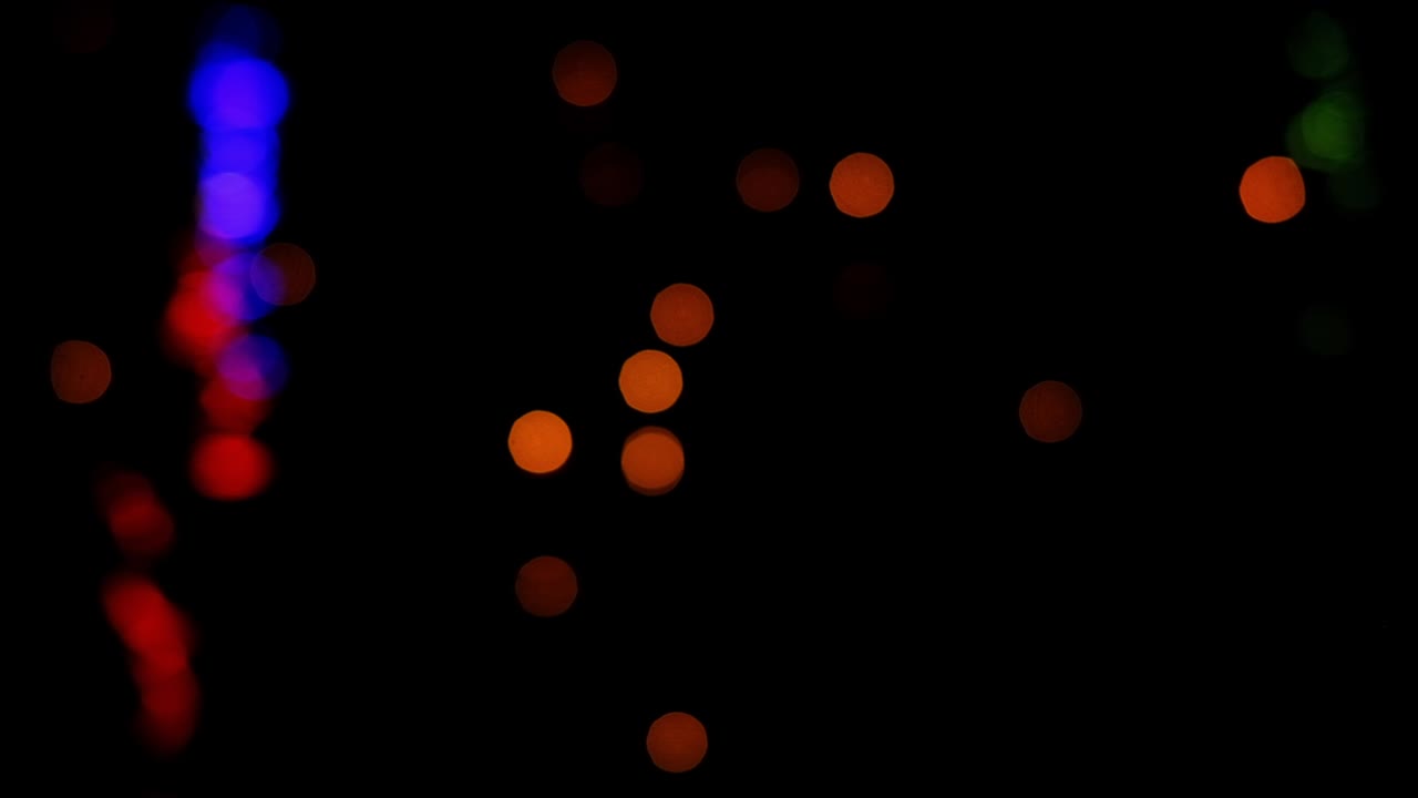 Abstract bokeh background of lights, blurry at night time. Lights and color, reflection shadows and bokeh.