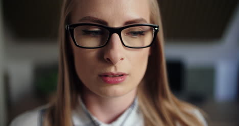 stressed executive talking on cellphone in office