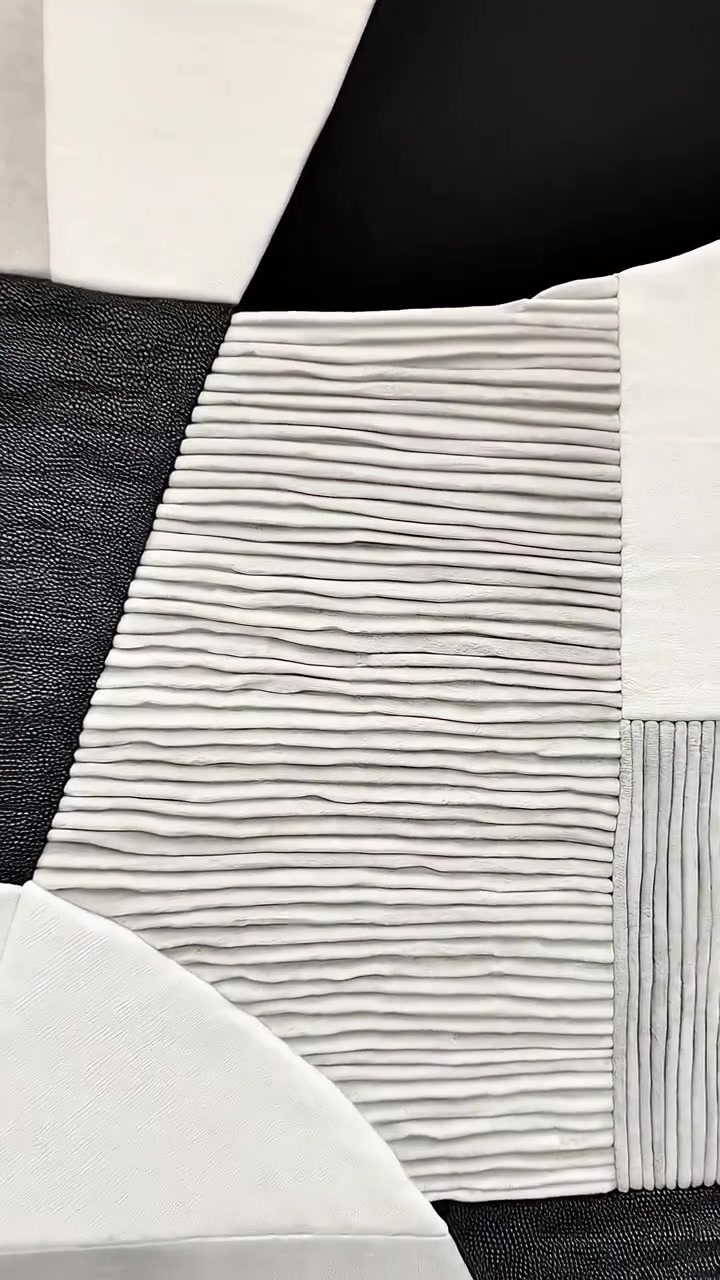 Detailní záběr na abstraktní černobílé texturované geometrické umění