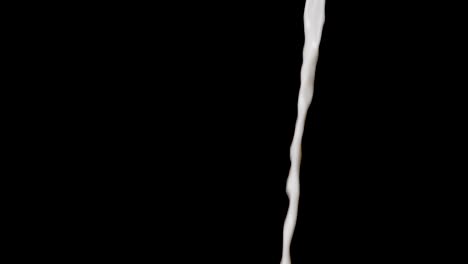 Pouring-Dripping-Fresh-Vegan-Oat-Milk-in-front-of-Black-Background