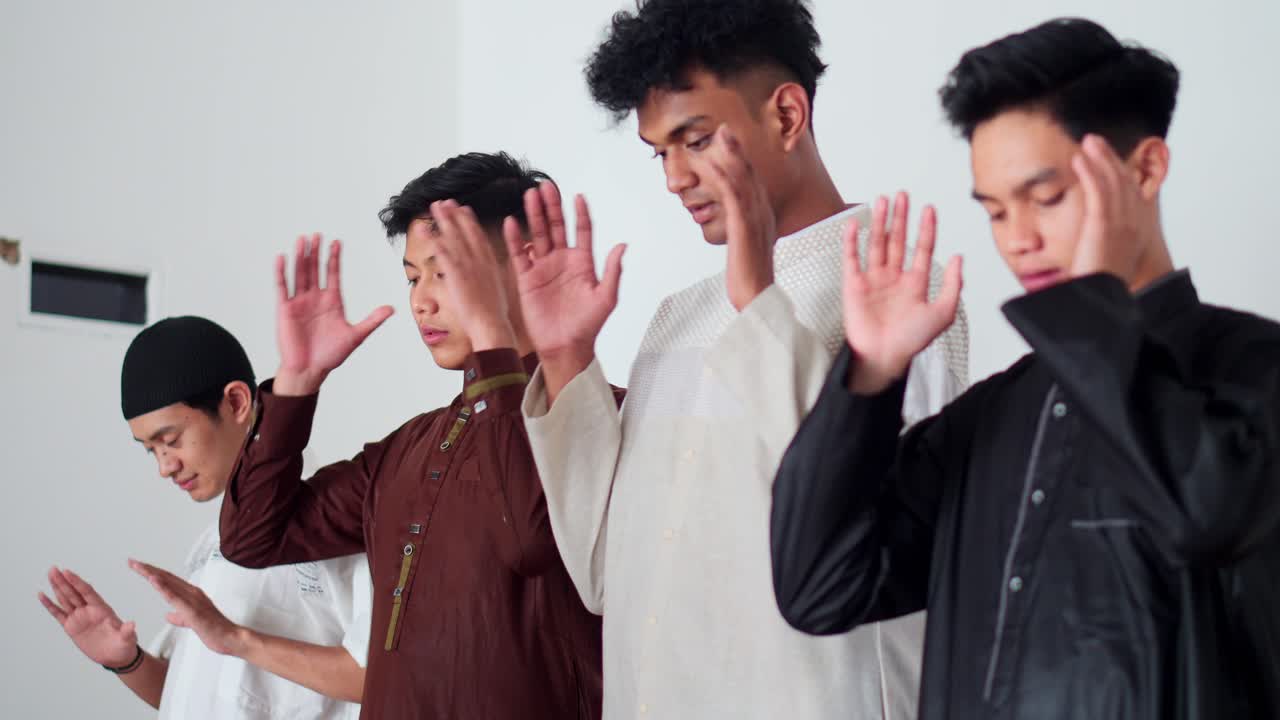 Group Of Young Muslim Men Starting Pray Salah Together In The Mosque