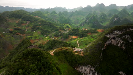 high above ha giang loop’s embrace, where winding roads twist with grace