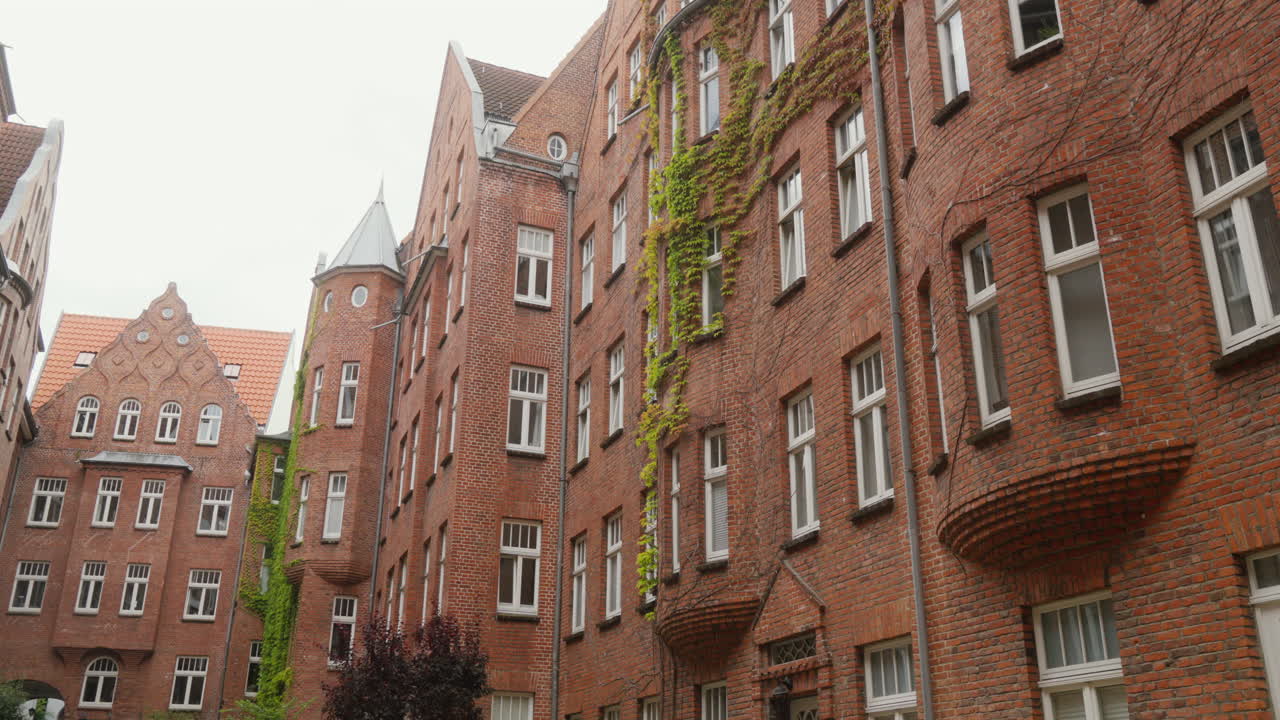 Charming historic architecture in Flensburg, Germany. Ideal for travel documentaries or architectural studies. Burghof.