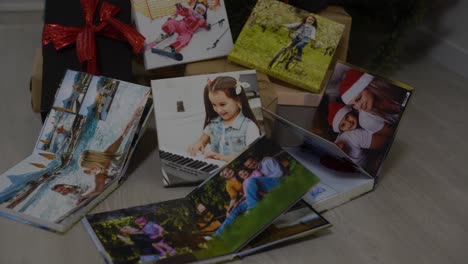 photobooks near the new year tree, colored as a gift for the holiday.