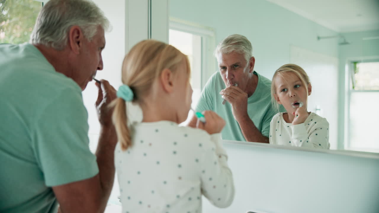 Grandfather, grandchild and brushing teeth
