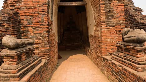 exploring ancient buddha statue in ayutthaya temple