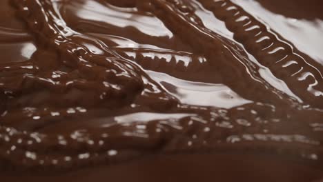melted chocolate pouring and swirling
