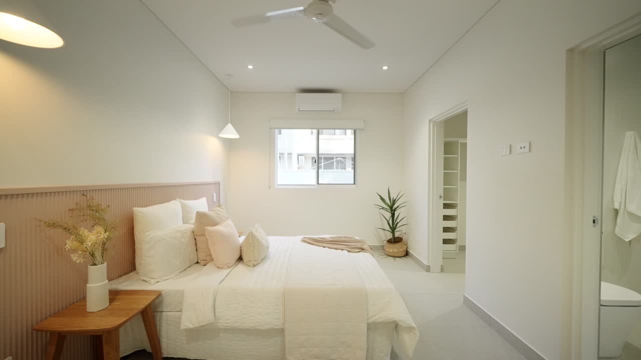 Stylish modern bedroom interior in a luxury small home, featuring sleek design and natural lighting. Interior of house home staged for real estate.