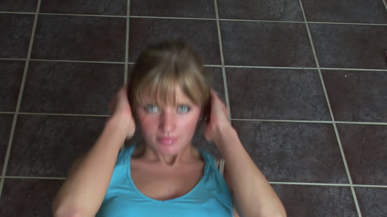 Woman at home Doing situps