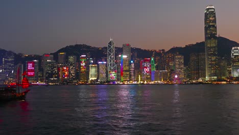 chinese junkboat in victoria harbour at night
