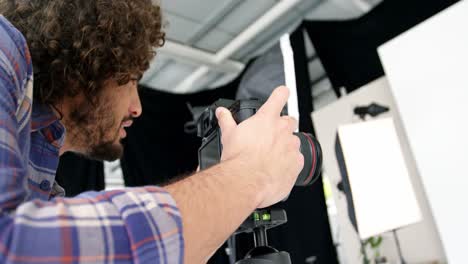 photographer taking photo with professional digital camera