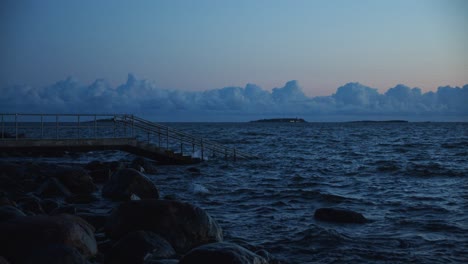 Waves-crashing-on-the-sea-shore-in-dusk