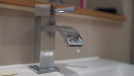 a dripping faucet in slow motion.