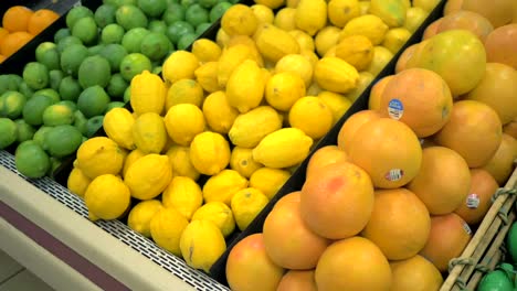 4k frutas cítricas frescas deslizante tiro tienda de comestibles producir agrio