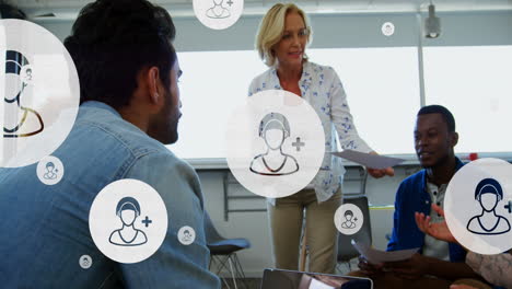 animation of digital icons with data processing over diverse business people in office