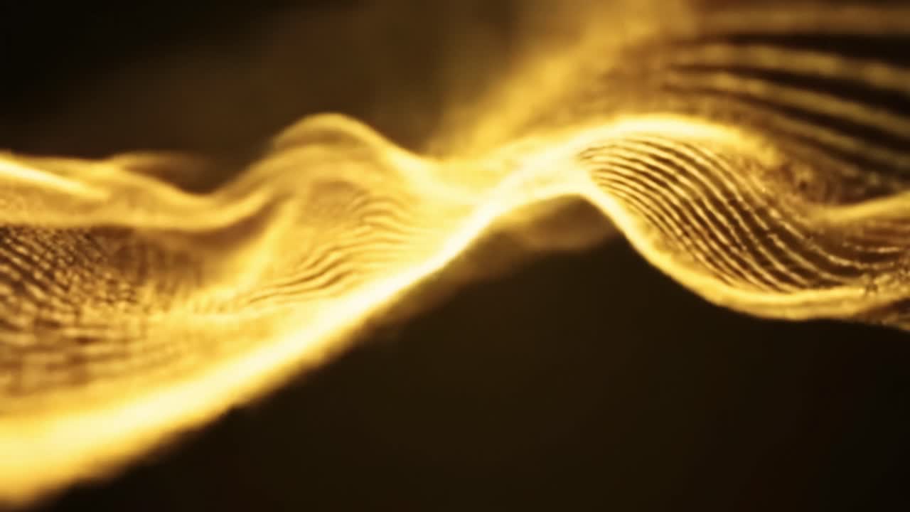 Golden waves flow gracefully, creating captivating patterns against a dark backdrop. The vibrant contrasts highlight fluid movements, inviting exploration of light and texture.