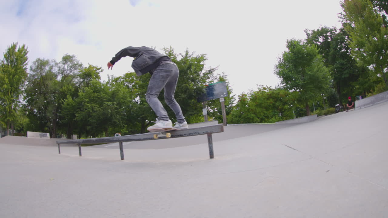Skateboard grind on a flat rail
