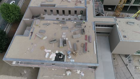 new building construction. construction workers in the roof