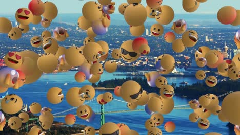 animación de globo múltiple que cae emojis en el fondo azul.