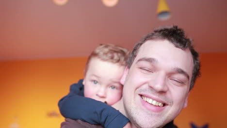 close up portraits of happy father and his son