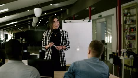 Diverse-Business-People-At-Seminar-Sitting-In-A-Modern-Office